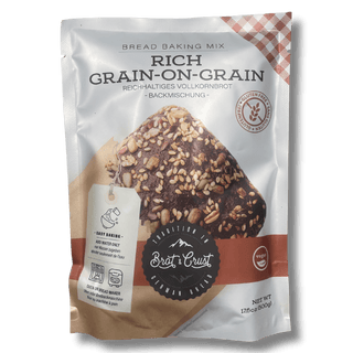 Bread baking mix package from Brot & Crust with a checkered pattern on a white background