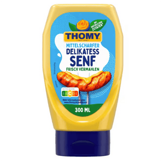 Thomy mustard bottle with blue and yellow label on a white background